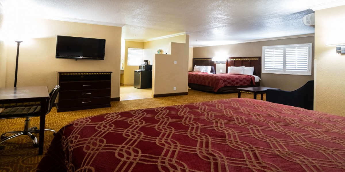 1 King Bed and 2 Queen Beds Suite Non Smoking at the Econo Lodge Inn & Suites Fallbrook Downtown
